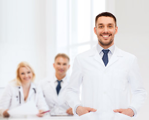 Image showing smiling male doctor in white coat