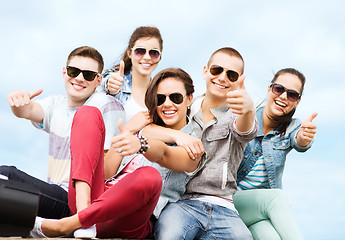 Image showing teenagers showing thumbs up