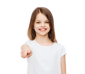 Image showing little girl in blank white t-shirt pointing at you