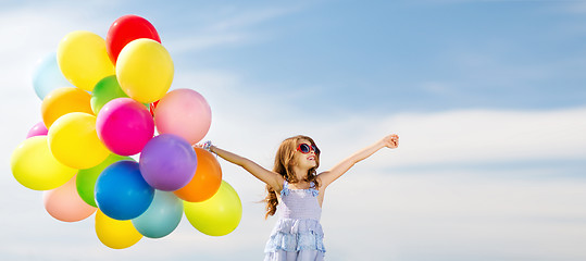 Image showing happy girl with colorful balloons