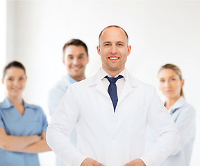 Image showing smiling male doctor in white coat