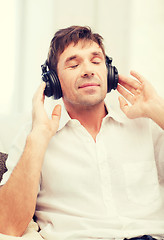 Image showing man with headphones listening to music