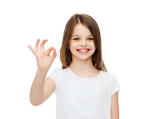 Image showing little girl in white t-shirt showing ok gesture