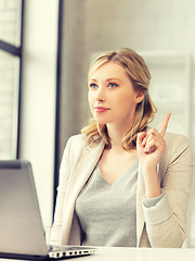 Image showing woman with laptop and finger up