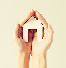 Image showing woman hands with paper house