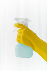 Image showing close up of hand with cleanser spraying