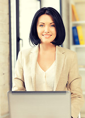 Image showing happy woman with laptop computer