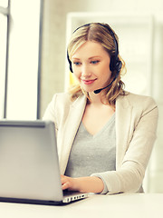 Image showing helpline operator with laptop computer