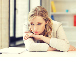 Image showing unhappy woman in office
