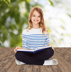 Image showing student girl studying and reading book