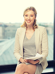 Image showing happy woman with documents