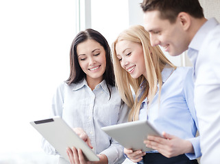 Image showing business team working with tablet pcs in office