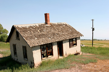 Image showing crooked and abandoned home
