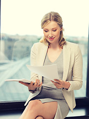 Image showing happy woman with documents