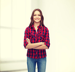 Image showing smiling young woman in casual clothes