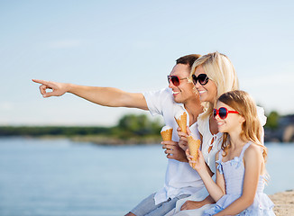 Image showing happy family eating ice cream