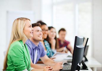 Image showing students with computers studying at school