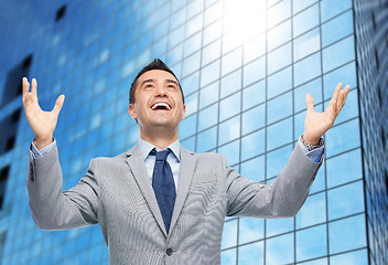 Image showing happy laughing businessman in suit