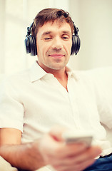 Image showing man with headphones listening to music