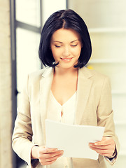 Image showing happy woman with documents