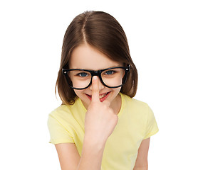 Image showing smiling cute little girl in black eyeglasses