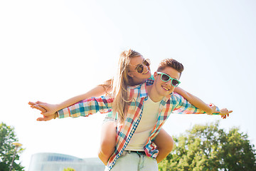 Image showing smiling couple having fun in park