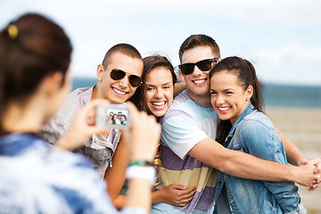 Image showing teenagers taking photo outside