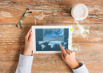 Image showing close up of hands with tablet pc and virtual graph