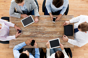 Image showing business team with smartphones and tablet pc