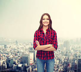 Image showing smiling young woman in casual clothes