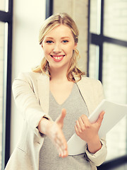 Image showing woman with an open hand ready for handshake