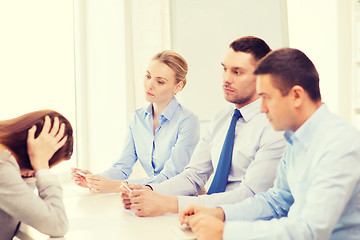 Image showing businesswoman getting fired in office