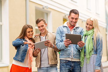 Image showing group of smiling friends with tablet pc computers