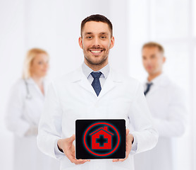 Image showing smiling male doctor with tablet pc