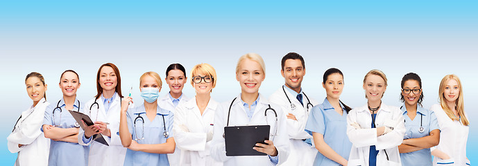 Image showing smiling female doctors and nurses with stethoscope