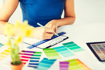 Image showing woman working with color samples for selection