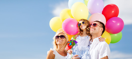 Image showing family with colorful balloons