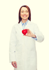 Image showing smiling female doctor with heart