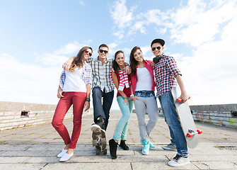 Image showing teenagers with skates outside