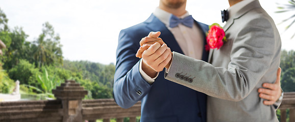 Image showing close up of happy male gay couple dancing