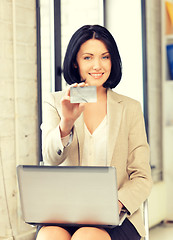 Image showing happy woman with credit card