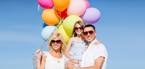 Image showing family with colorful balloons