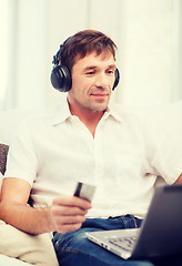 Image showing man with headphones listening to music