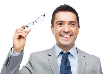 Image showing happy smiling businessman in eyeglasses and suit