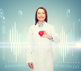 Image showing smiling female doctor with heart