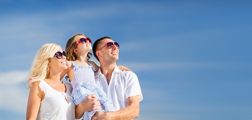 Image showing happy family with blue sky