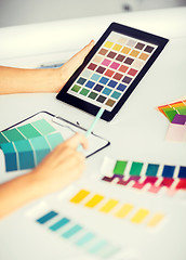 Image showing woman working with color samples for selection