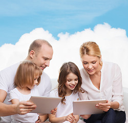 Image showing happy family with tablet pc computers