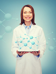 Image showing smiling female doctor and tablet pc computer