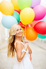 Image showing woman with colorful balloons